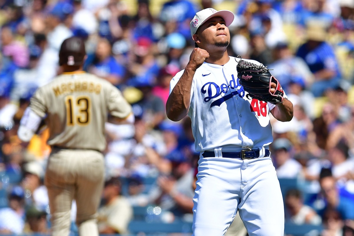 Los Angelespitcher Brusdar Graterol (48) reacts following the top of the eighth inning after third baseman Manny Machado (13) grounds out at Dodger Stadium. (Gary A. Vasquez-USA TODAY Sports)